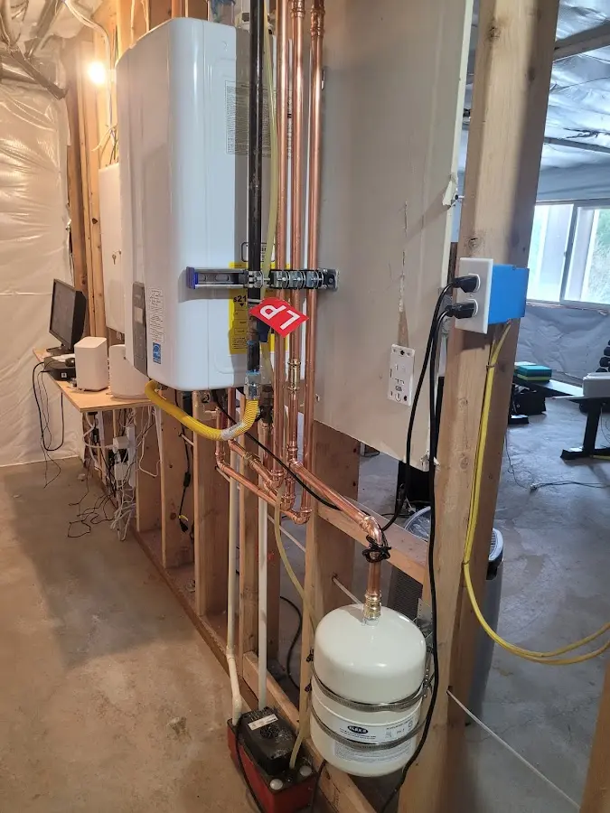 Licensed plumber repairing a kitchen sink in Pine Creek